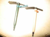 A002 Hasbro Reissued Australian shovel (right).